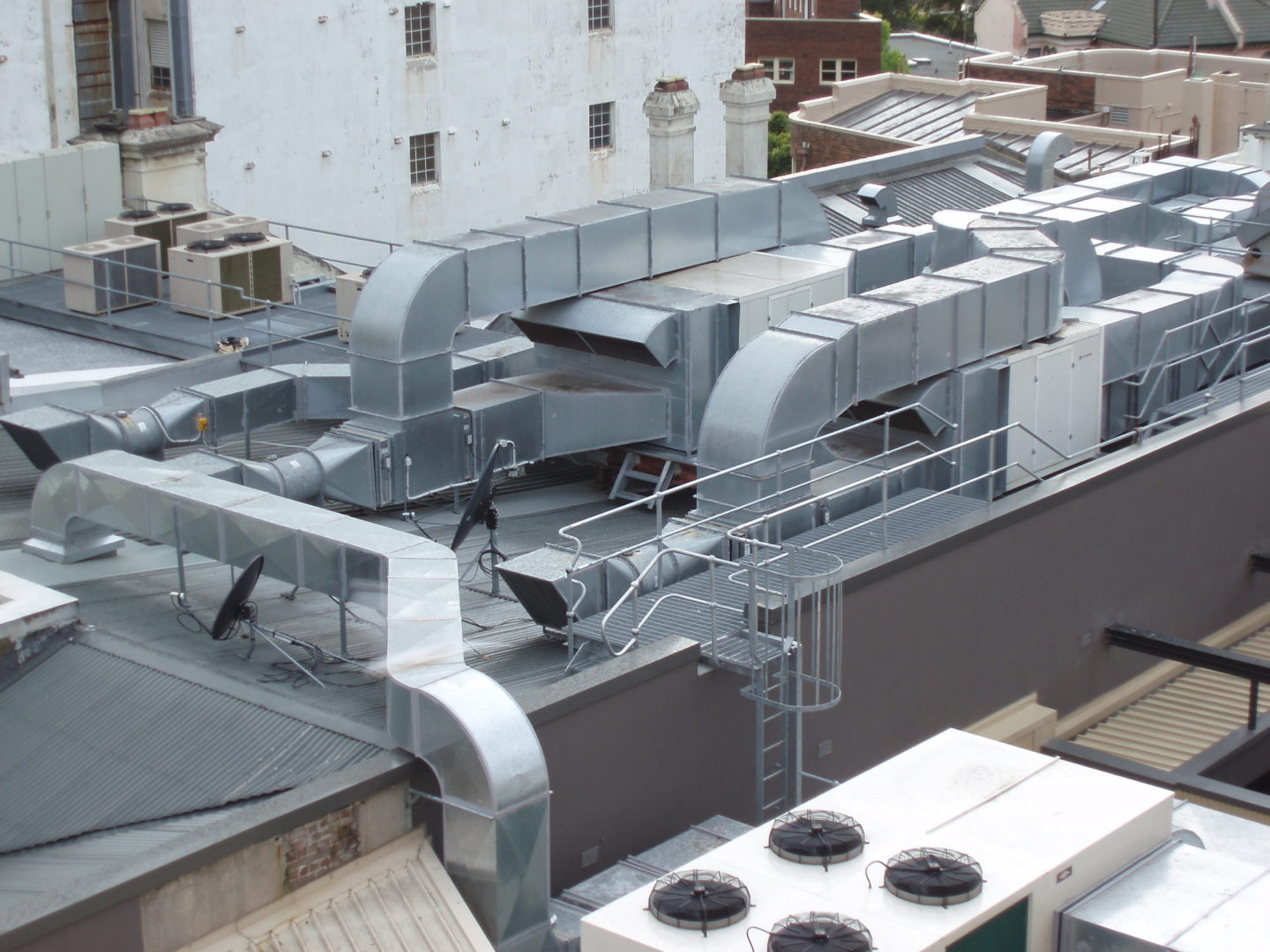 complex interconnecton air ducting on a roof top